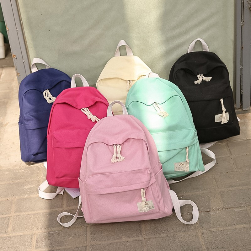 騰彩日韓潮流純色簡(jiǎn)約帆布雙肩包休閑旅行包男女學(xué)院風(fēng)書(shū)包學(xué)生背E1 藏藍(lán)色